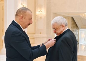 The kingpin of the Baku kleptocracy, Ilham Aliyev and Mikhail Gusman