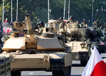 Bank of Japan holds rates, raises inflation outlook, fuelling rate hike speculation