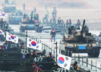 Bystander disarms gunman during Bondi Beach attack, is hailed as hero