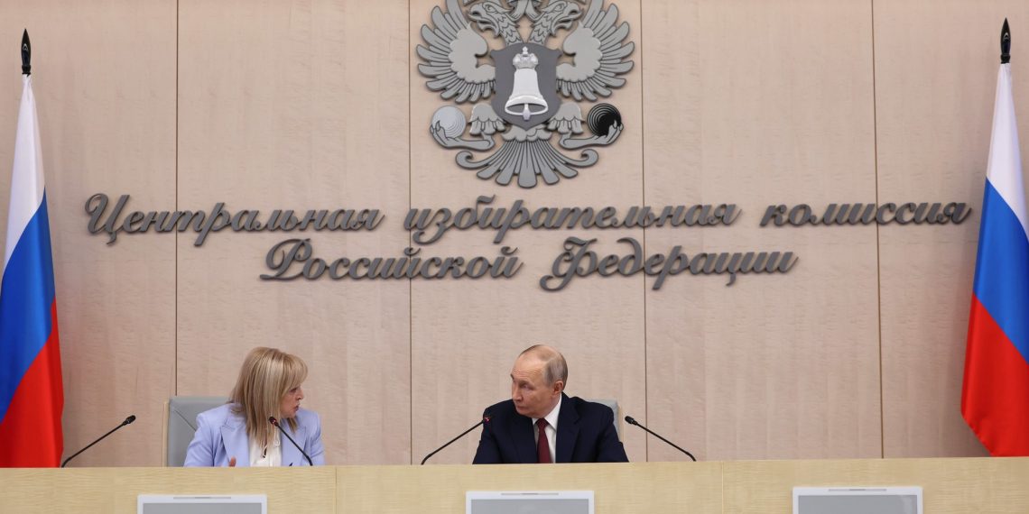 Putin meets election officials, stresses trust and stability