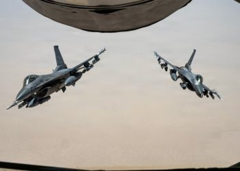 US and Iran Exchange Strikes Amid Talks in Doha